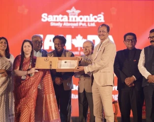 Santamonica receiving the Asia Book of Records award for the largest single pre-departure briefing, 7,236 students
